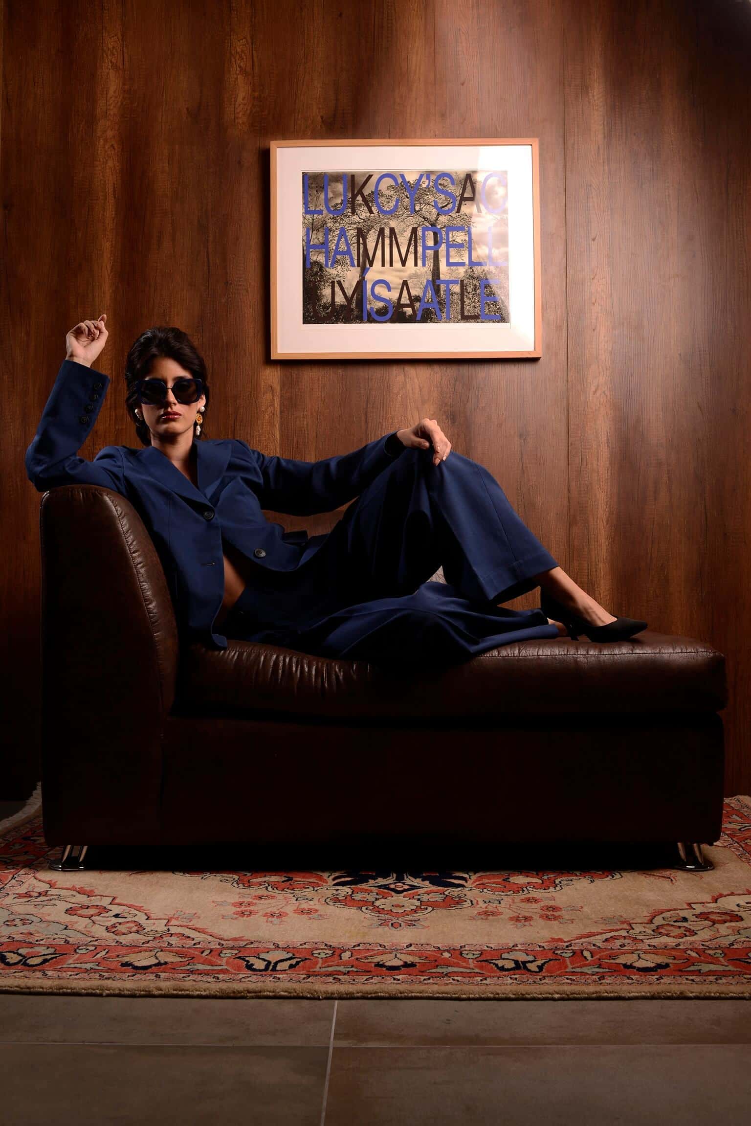 Confident woman in navy suit by Nena Cavalieri, Florence studio
