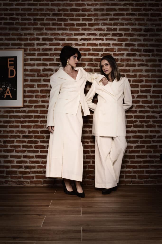 Models in white suits from Nena Cavalieri Florence collection