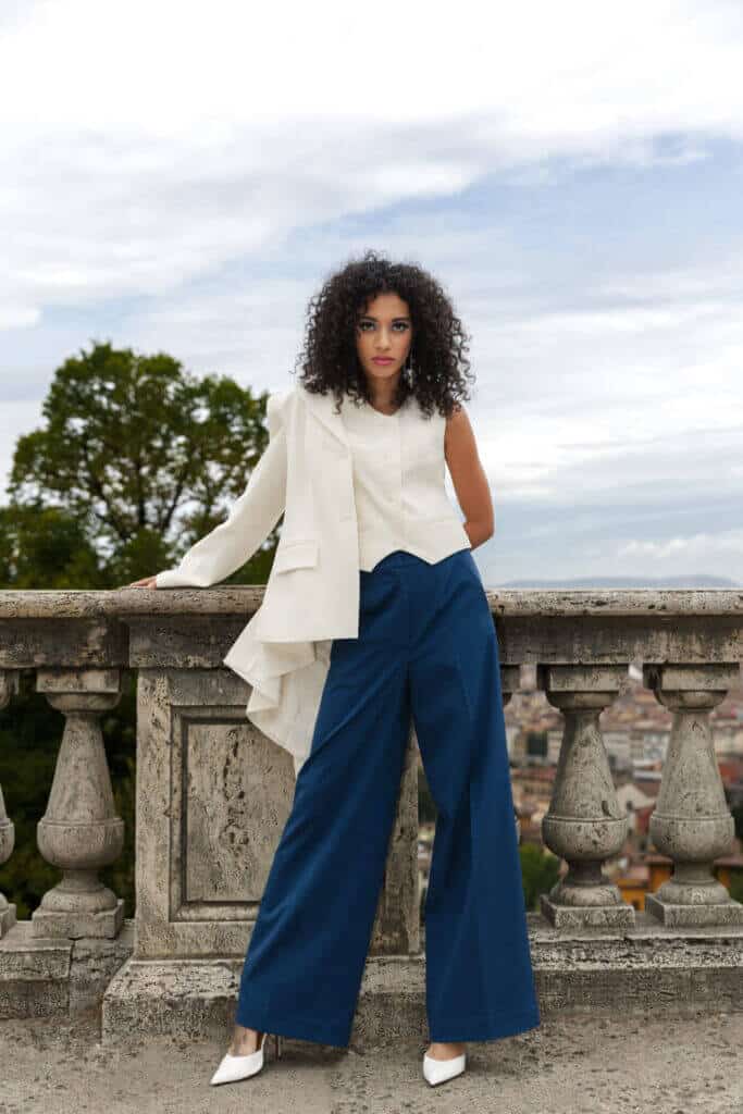 Model in white jacket and navy trousers, Nena Cavalieri Florence